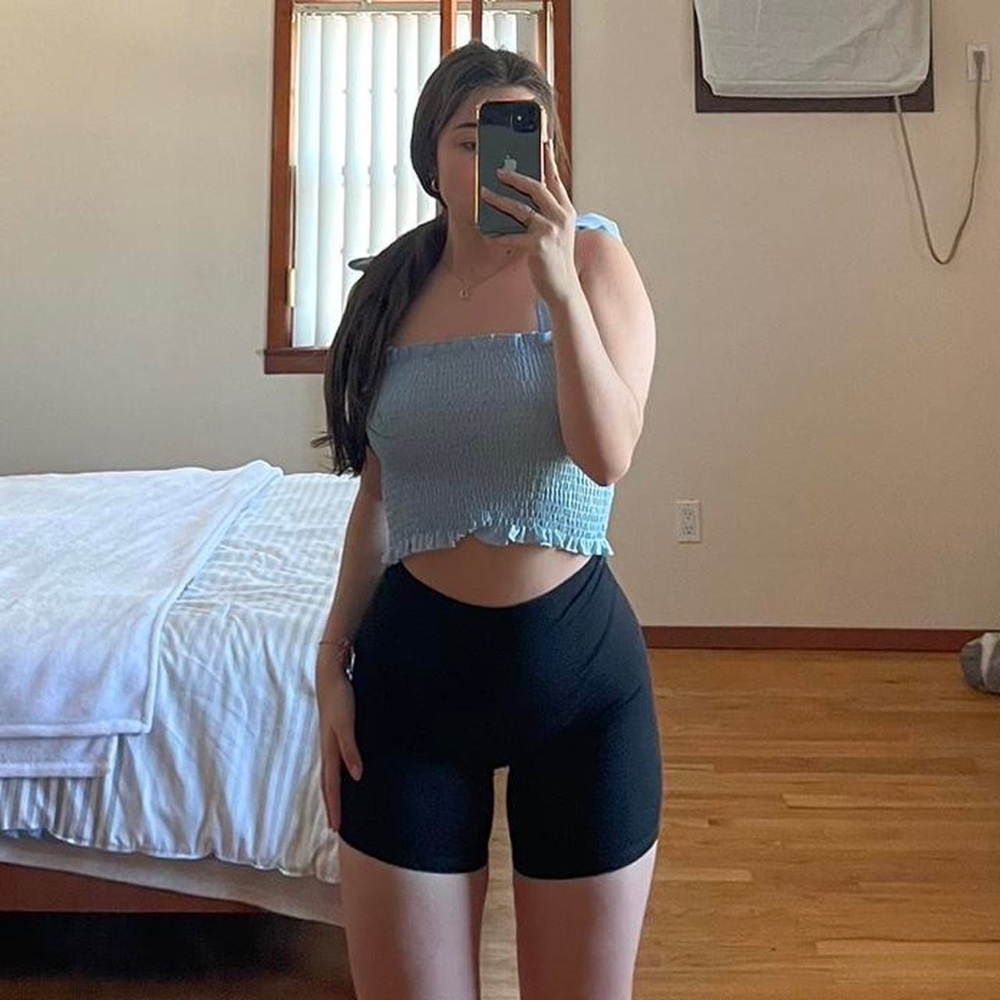 Blue ruched crop top with adjustable strap ties